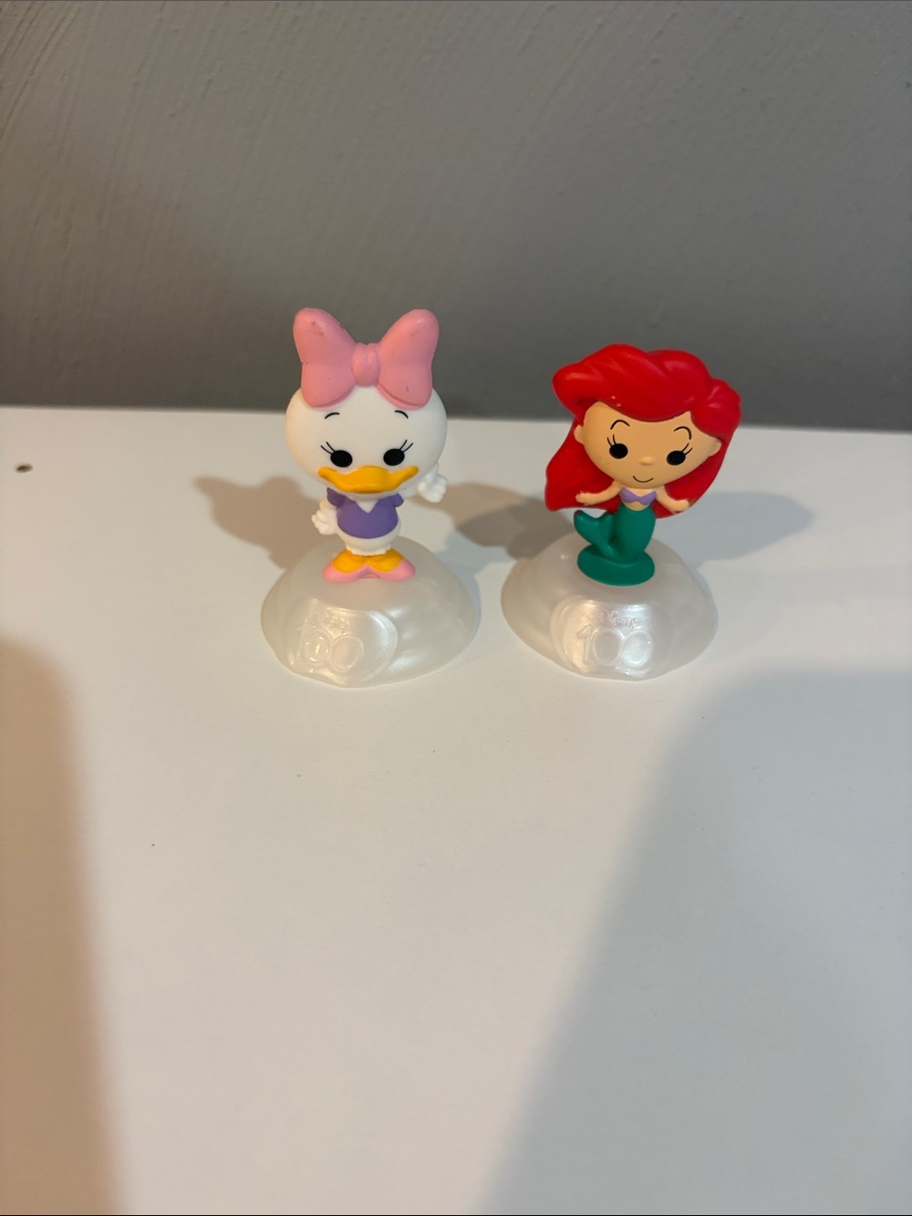 McDonald's Disney 100 year anniversary toys Daisy Duck and Ariel